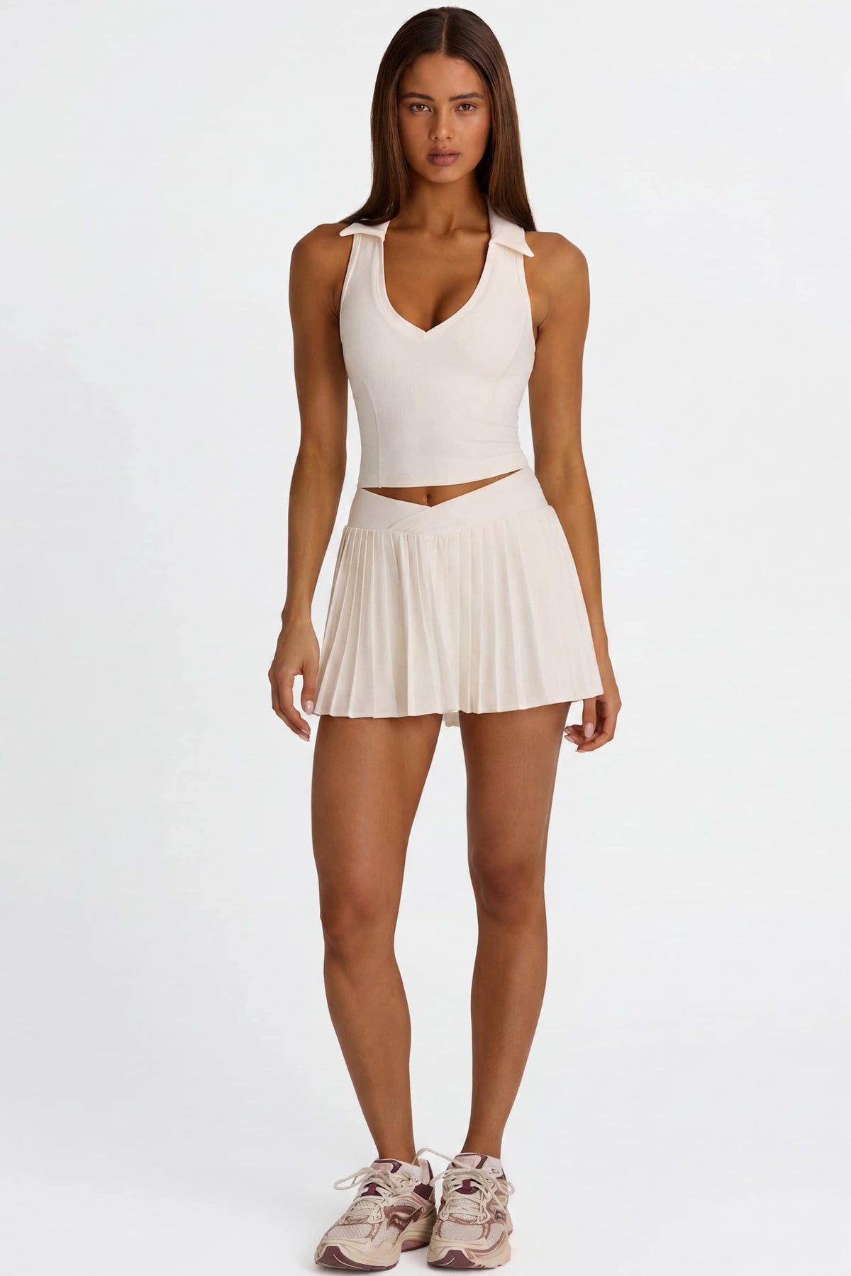 Soft Active Crossover Pleated Mini Skort In Coconut